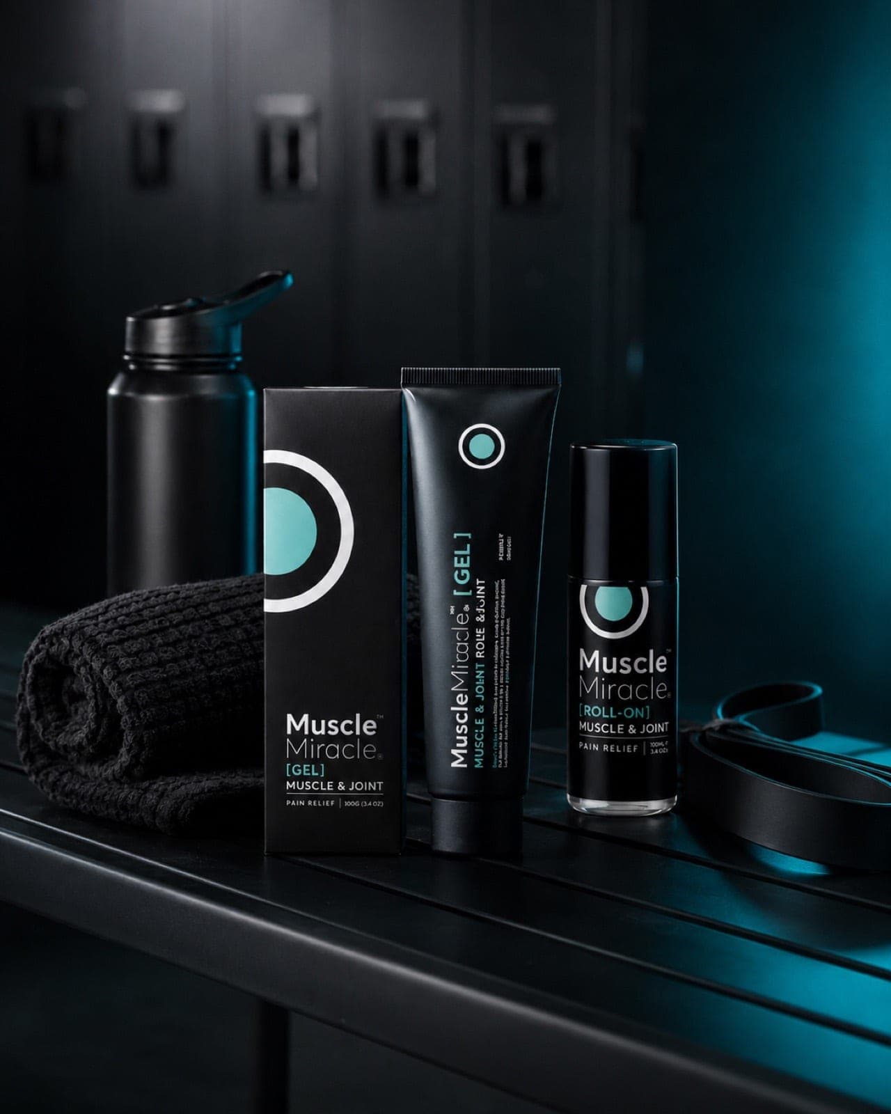 Muscle Miracle gel, roll-on, water bottle and towel on a gym bench after training