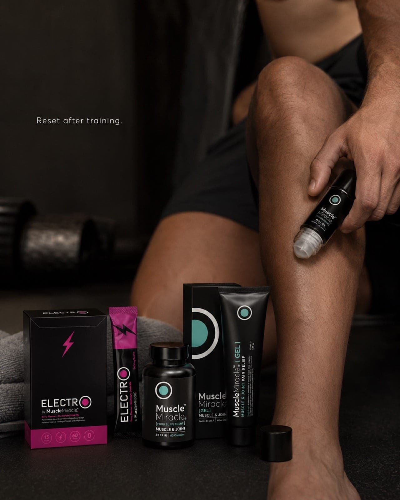 The full Muscle Miracle range — Electrolytes, capsules, gel and roll-on — laid out at the end of a session