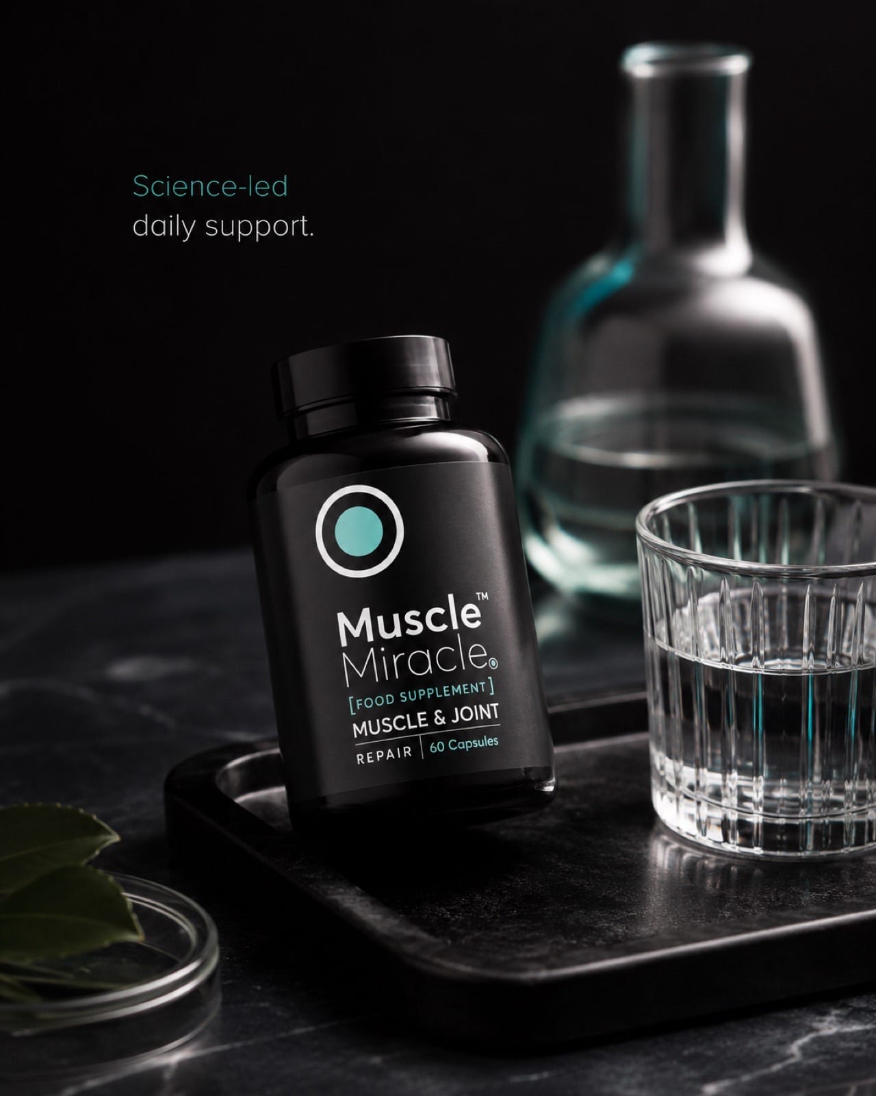 Muscle Miracle Recovery Capsules — on a dark surface with capsules