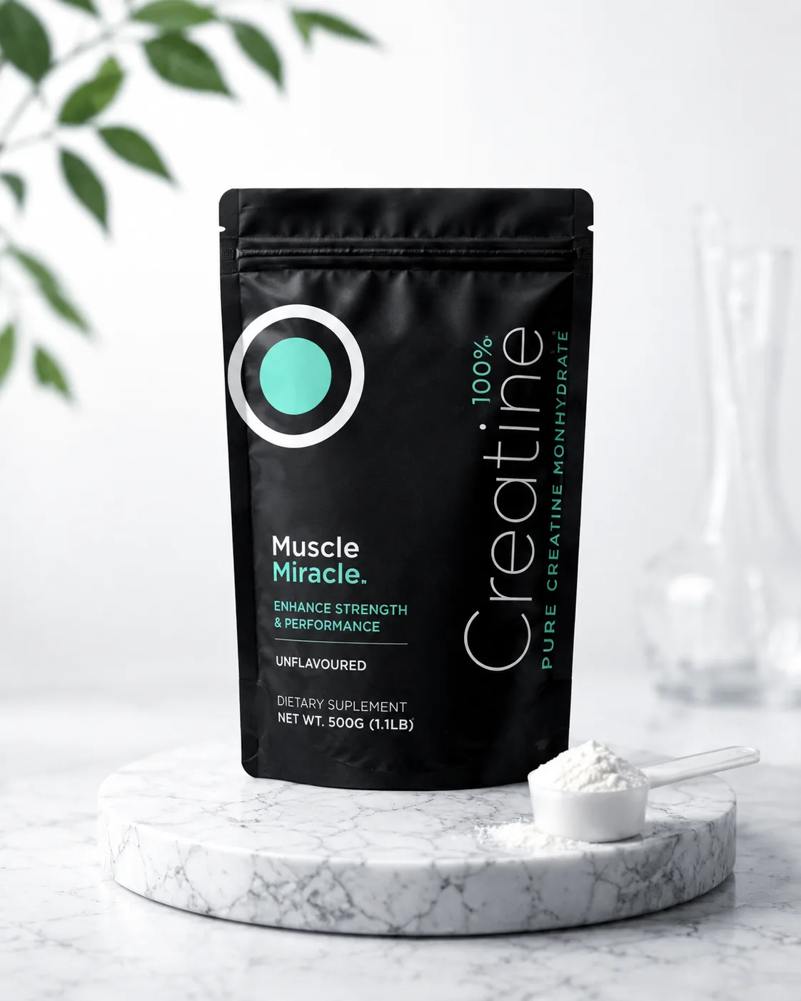 Muscle Miracle 100% Creatine pouch on a marble pedestal with a scoop of creatine powder