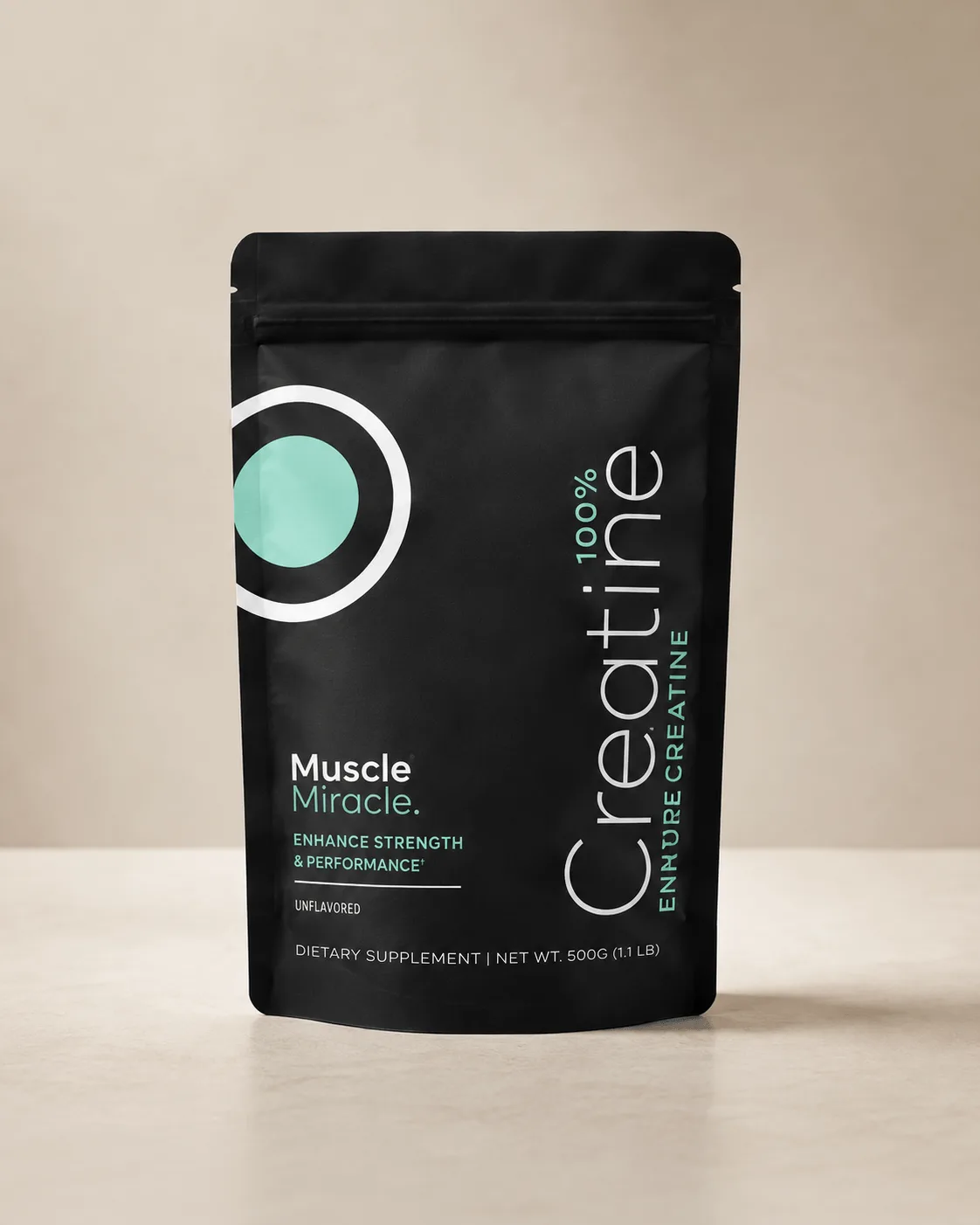 Muscle Miracle Creatine Monohydrate pouch on a warm beige surface